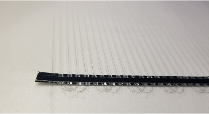 A photo of a windshield glass heating element.